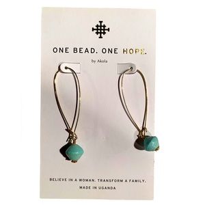 Lovely gold and blue earrings made in Uganda to support East African women.